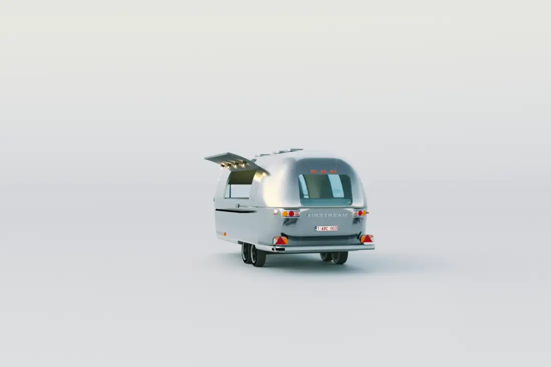 Caravane Airstream Safari 1976 en aluminium poli, ouverture bar latérale et comptoir bois